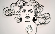 American painted portraits of celebrities with the help of a magnetic film