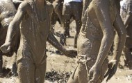 Celebrate Children playing in the mud