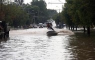 Two boys have fun in flood