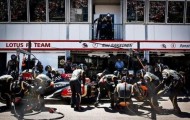 A couple in shining helmets at the Grand Prix de Monaco