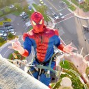Superheroes set about cleaning windows