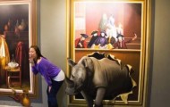 Funny poses of people in the Museum of deception